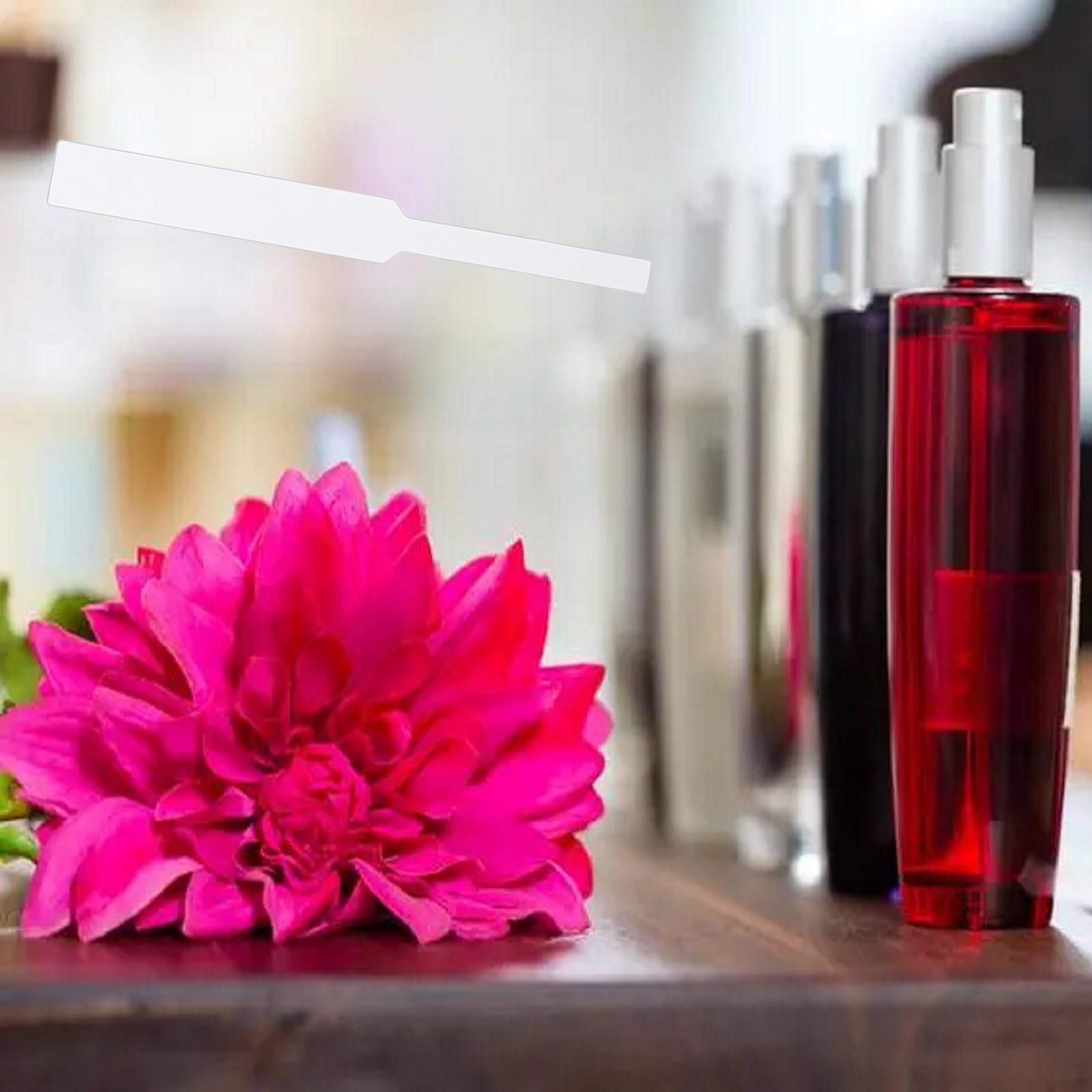 Joysorn perfume test strips absorb fragrance for quick scent evaluation.