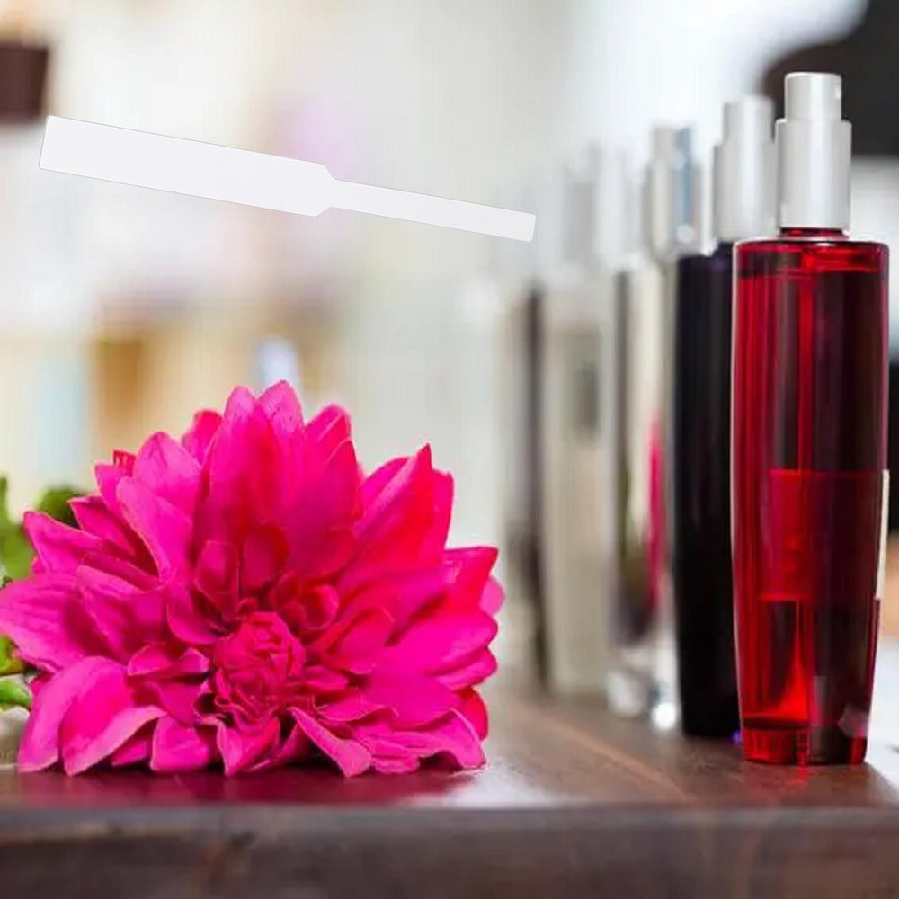 Joysorn perfume test strips absorb fragrance for quick scent evaluation.
