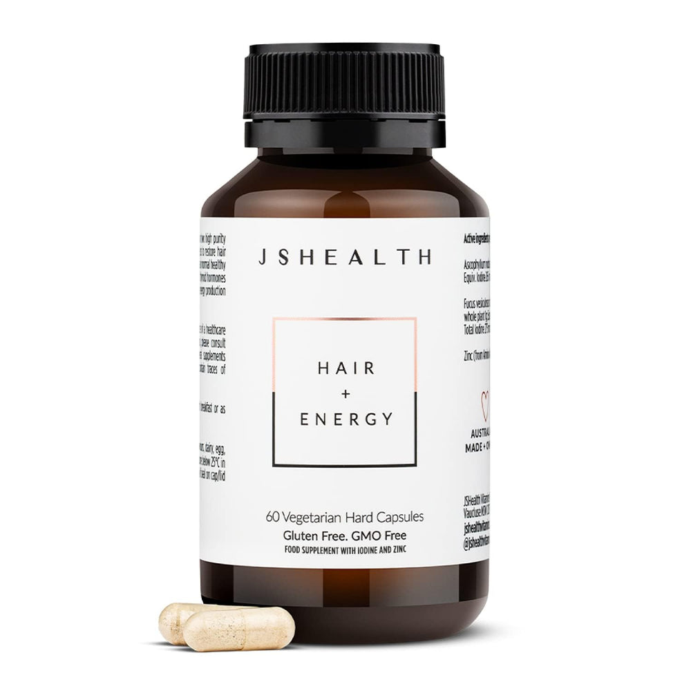 JSHealth Hair Formula bottle on a clean surface, ready for daily use.