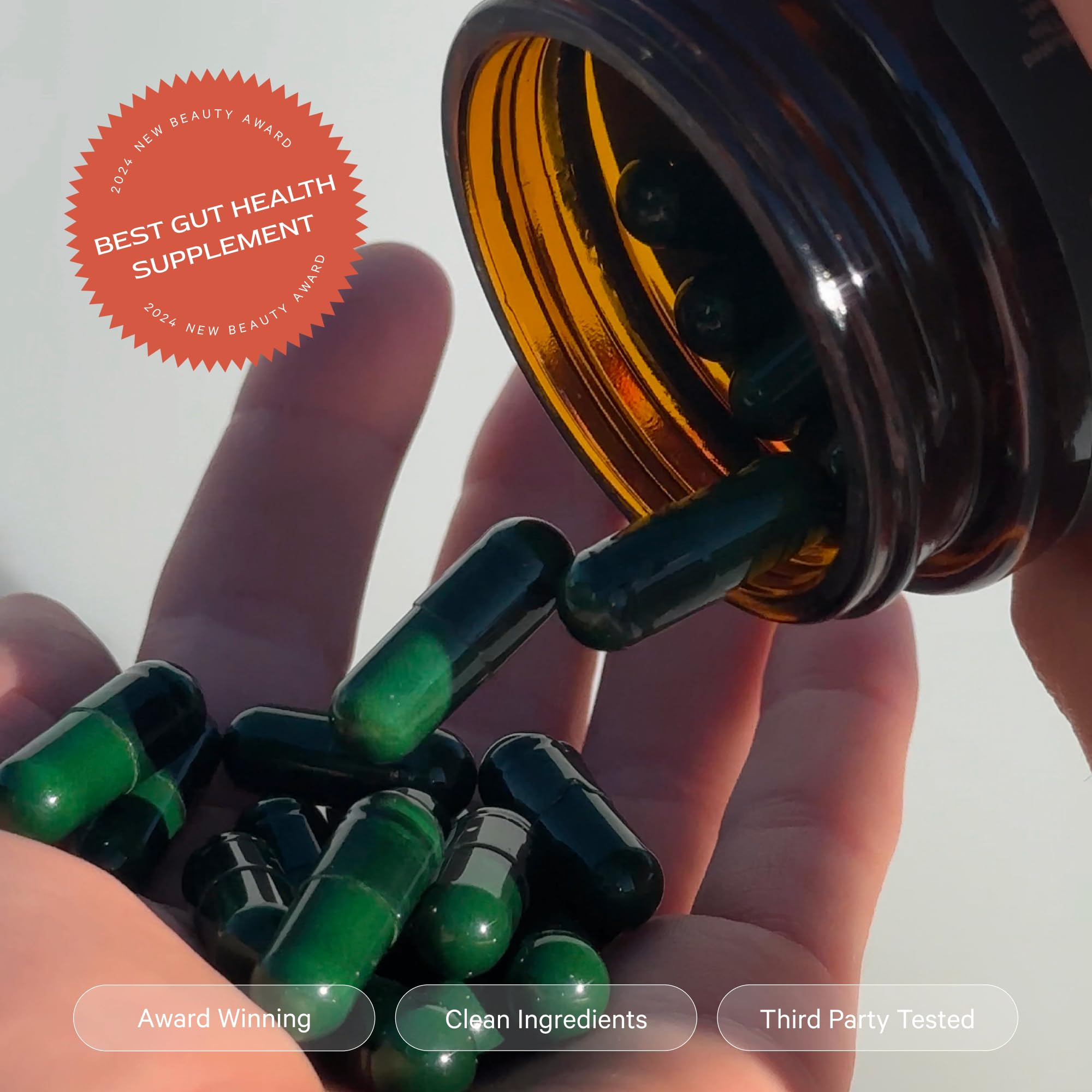 Lifestyle shot of Juna Gut Therapy with a glass of water