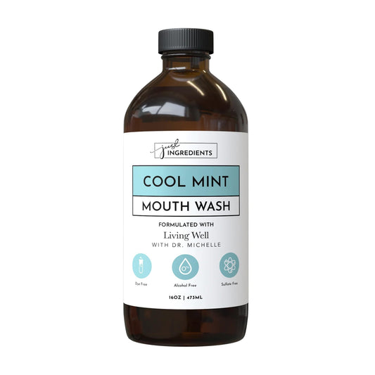 Just Ingredients Cool Mint Remineralizing Mouthwash bottle with hydroxyapatite and colloidal silver, fluoride-free and alcohol-free.