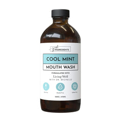 Just Ingredients Cool Mint Remineralizing Mouthwash bottle with hydroxyapatite and colloidal silver, fluoride-free and alcohol-free.