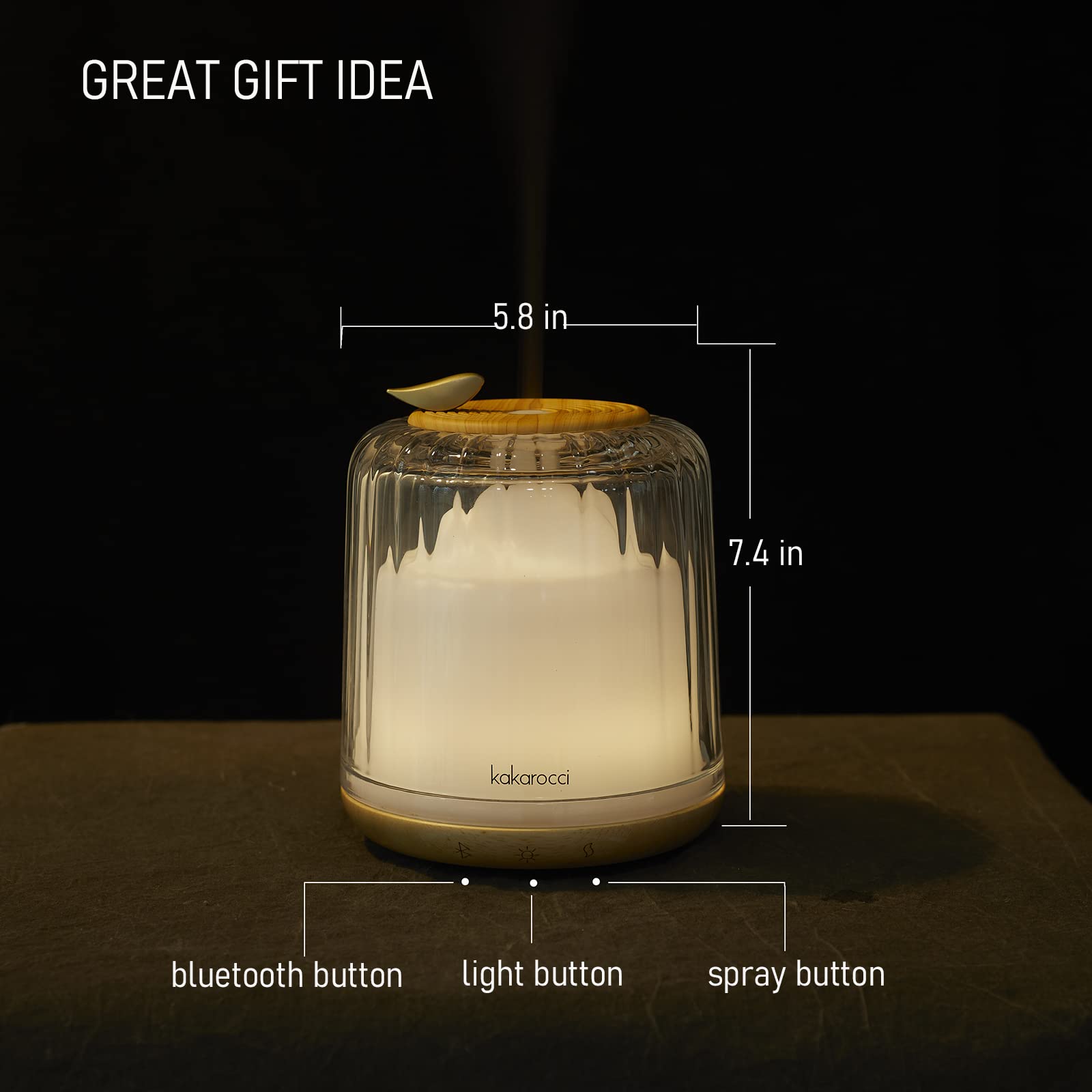 Close-up of glass dome and wood base on Kakoda essential oil diffuser