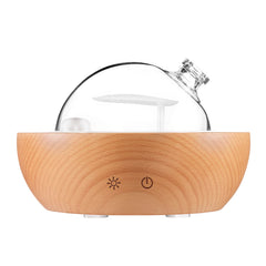 Kakoda glass essential oil diffuser with real wood base and seven-color LED ring.