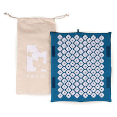 Kanjo memory foam acupressure foot mat with standing desk setup