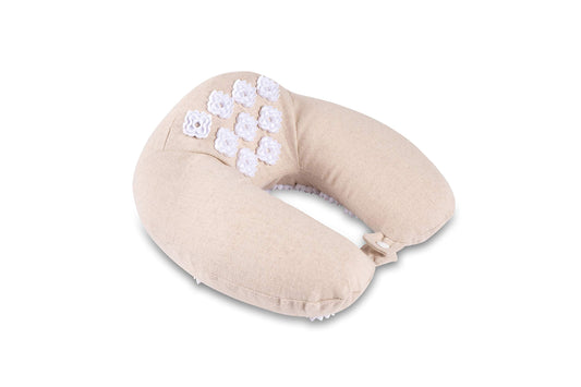 Side view of Kanjo neck pillow highlighting ergonomic shape