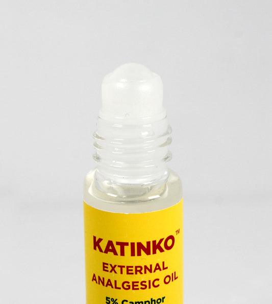 Close-up of Katinko roll-on applying to skin
