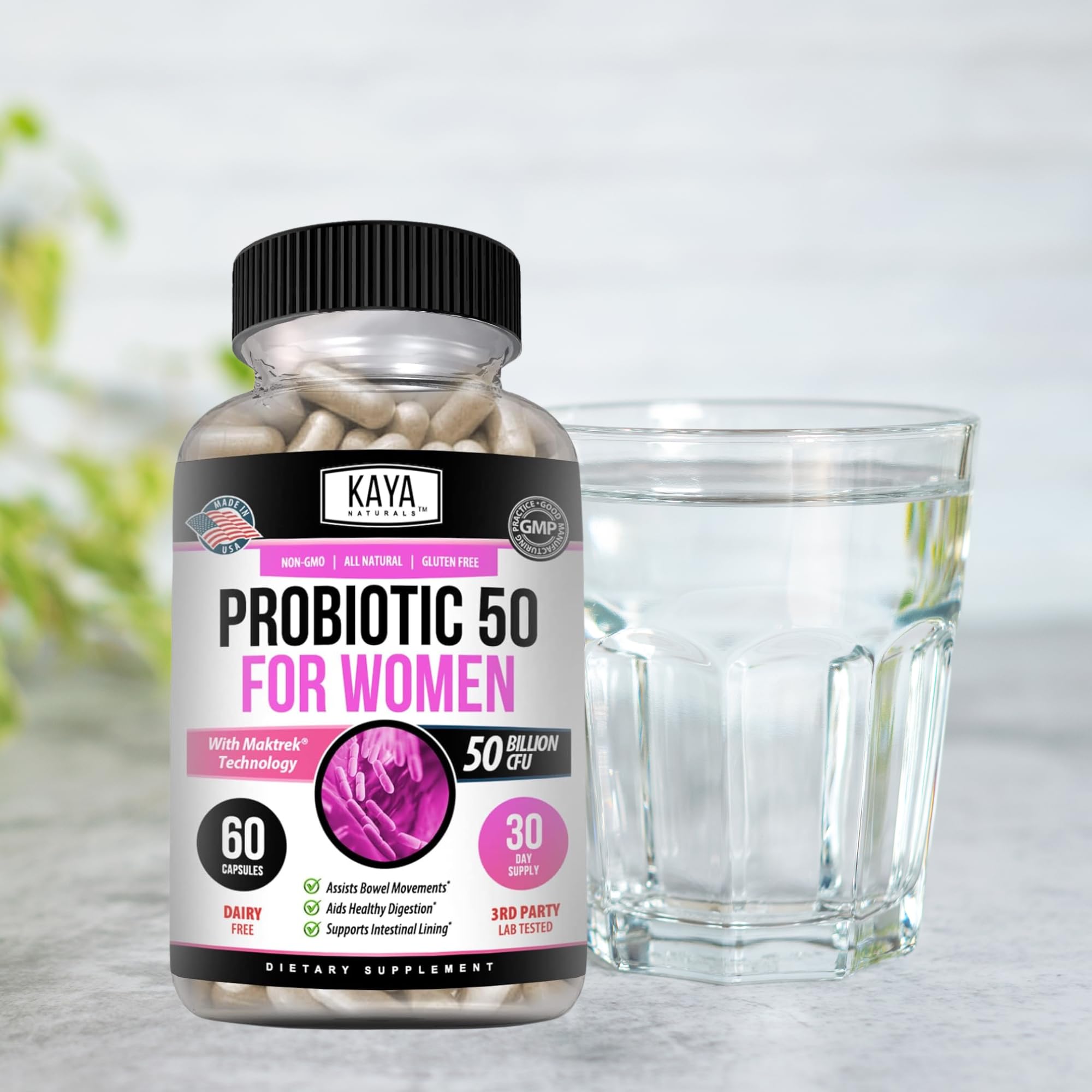 Optimistic woman holding Kaya Naturals probiotic bottle