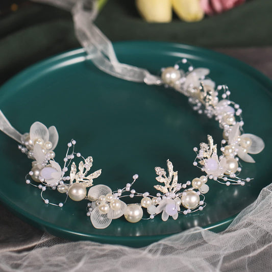 Kayzon girl flower headpiece with white pearl adds bridal sparkle and secure attachment.