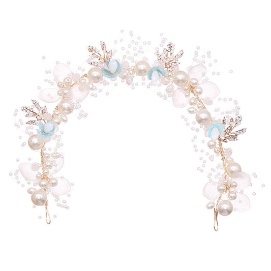 Kayzon kids wedding headpiece shows a blue princess flower detail for a graceful flower girl.