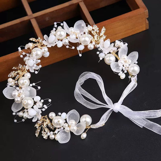 Kayzon white princess headband with crystals and pearls for a glamorous look.