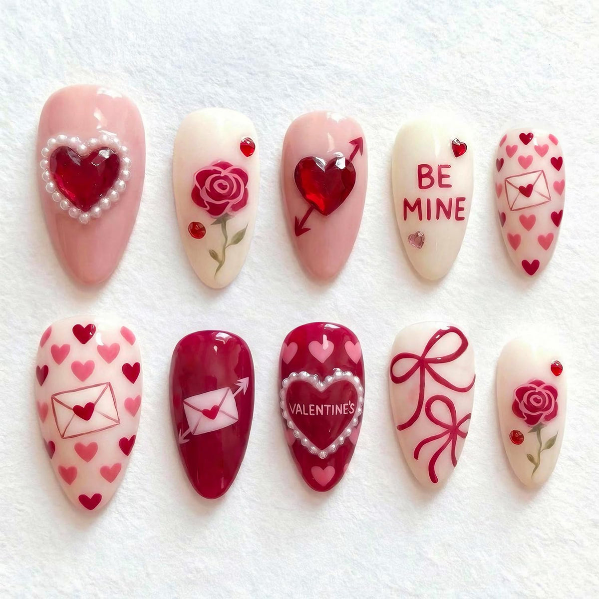 KEHKFSEF valentines press-on nails with heart pattern for quick, salon-like manicures at home.