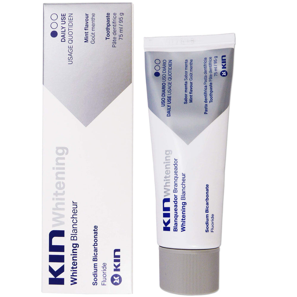 Close-up of Kin Whitening Toothpaste texture showing tiny sodium bicarbonate crystals