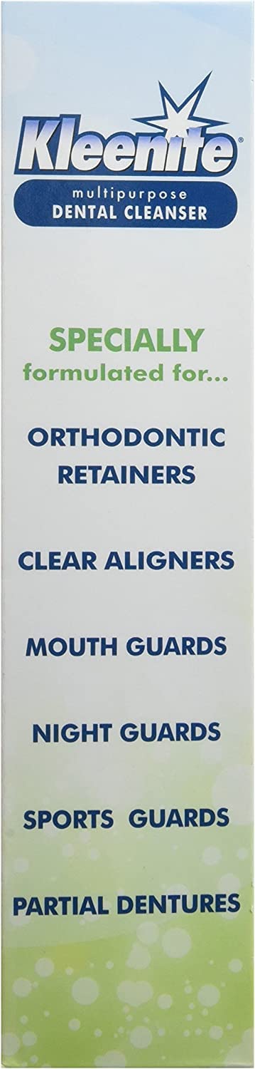 Denture soaking in Kleenite dental cleanser solution
