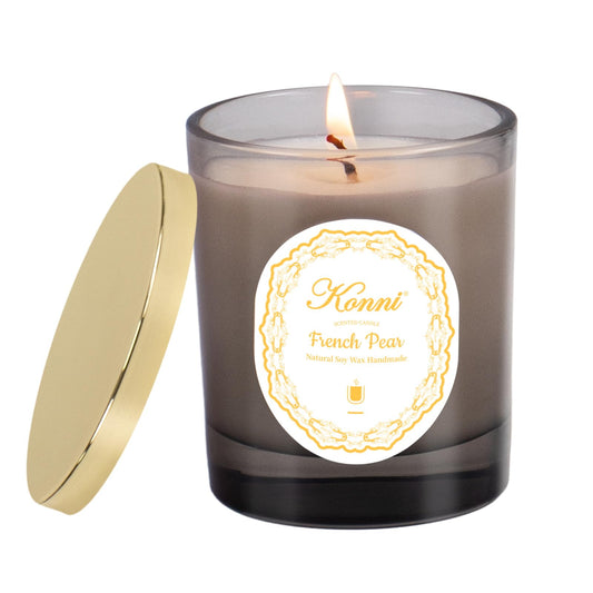 KONNI French Pear scented candle in a clear glass jar