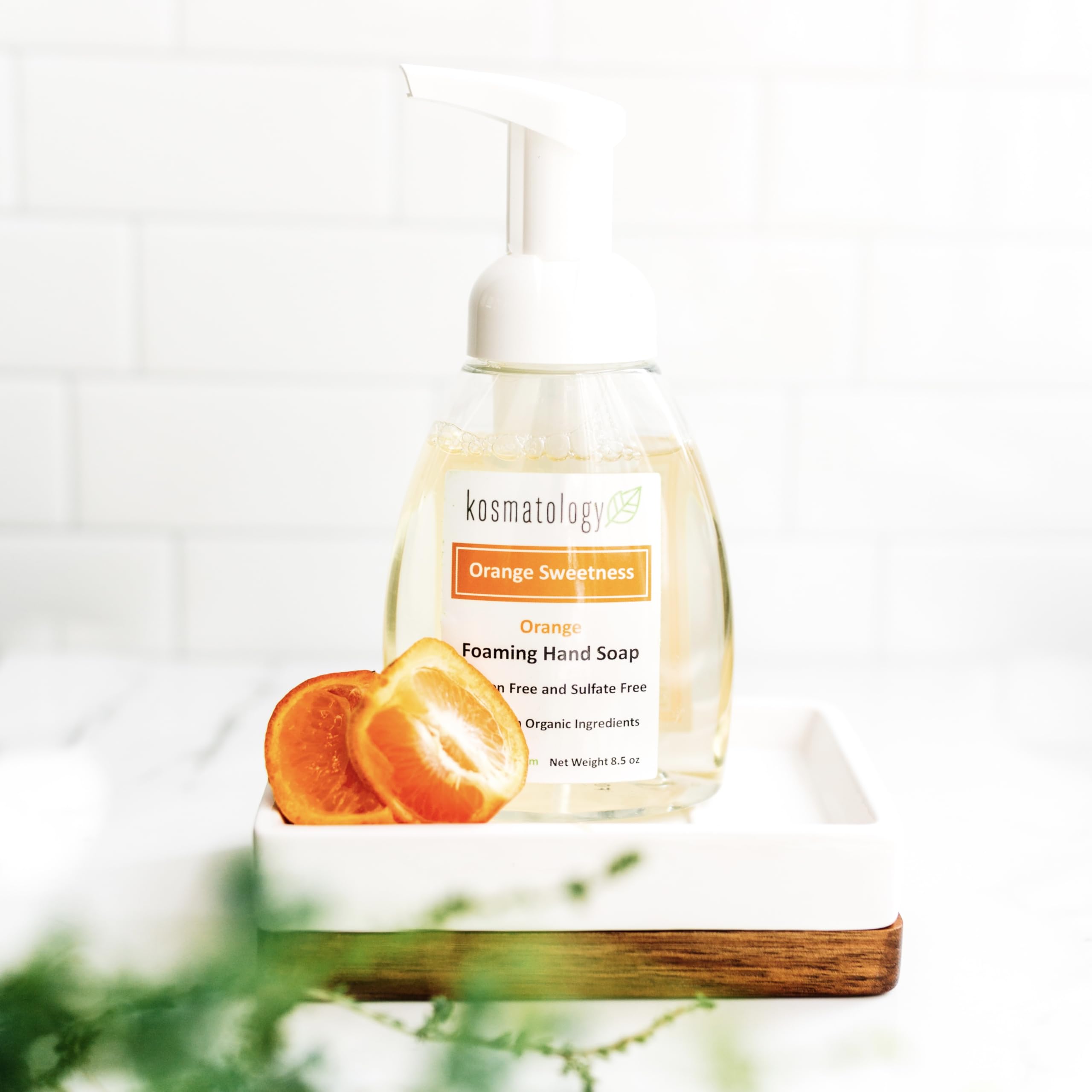 Kosmatology Orange Sweetness family-use scene suggesting safe for all ages.