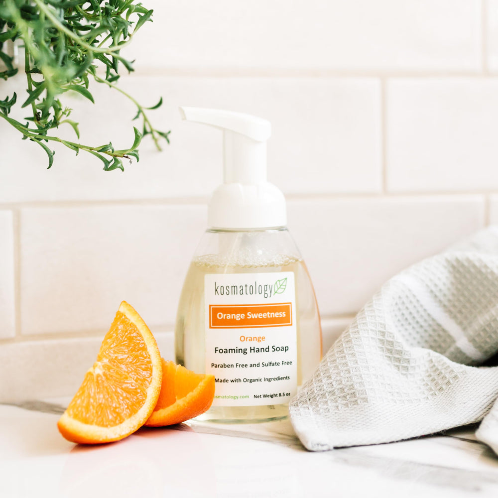Kosmatology Orange Sweetness ingredients list close-up highlighting natural oils.