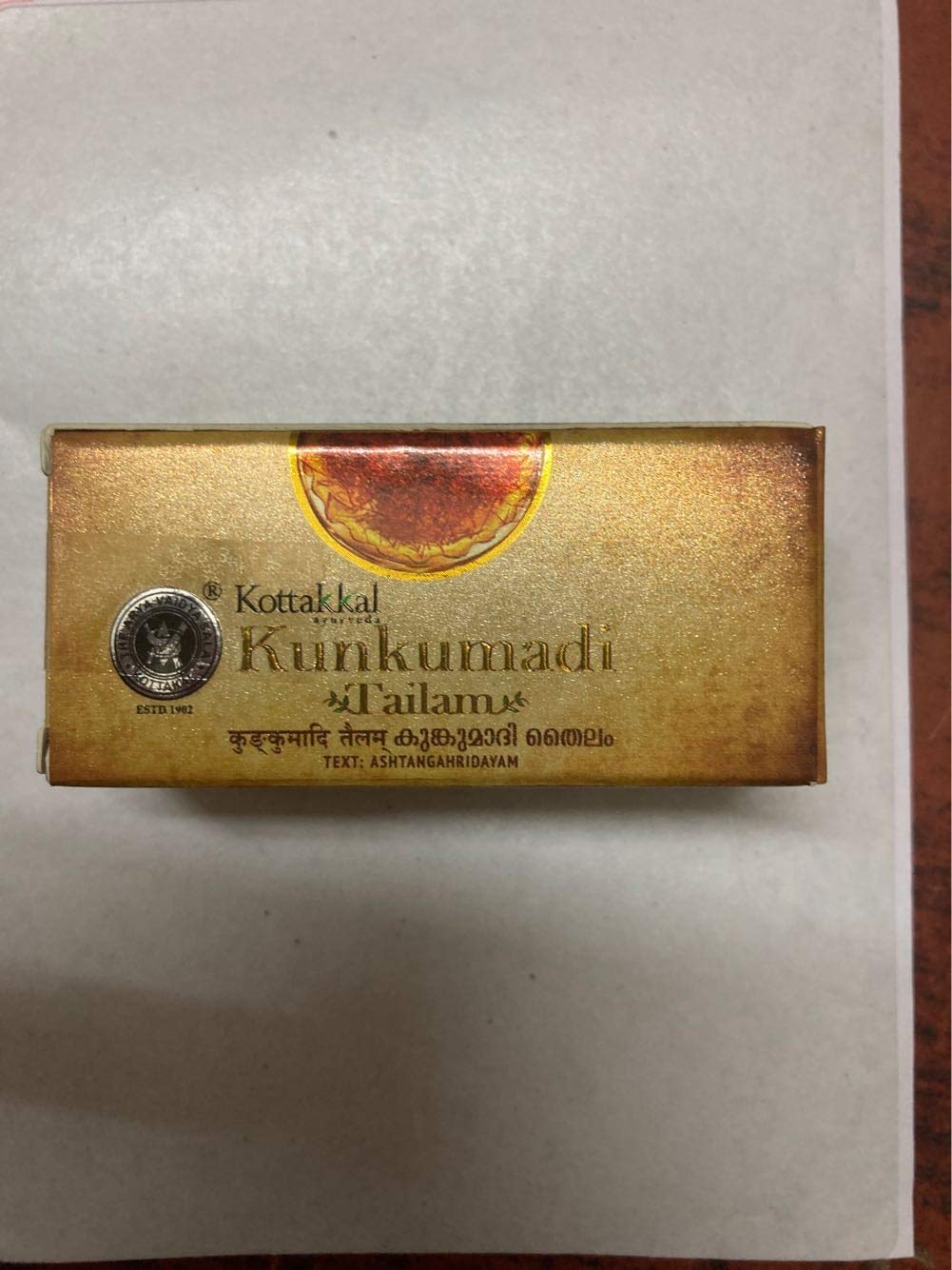 Kottakkal Arya Vaidya Sala Kunkumadi Tailam 10ml bottle - label and packaging