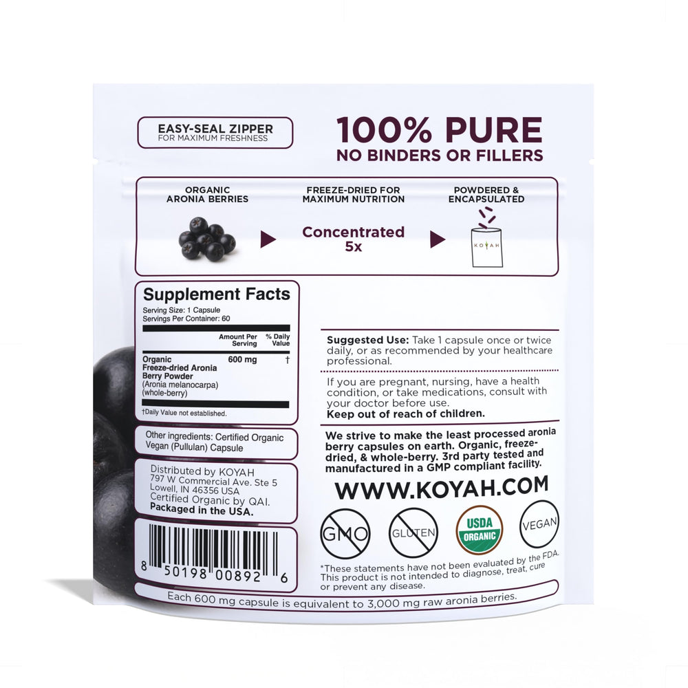 Vegan capsule filled with organic aronia berry powder