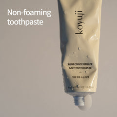 Roasted pine salt highlighted in Koyuji toothpaste packaging