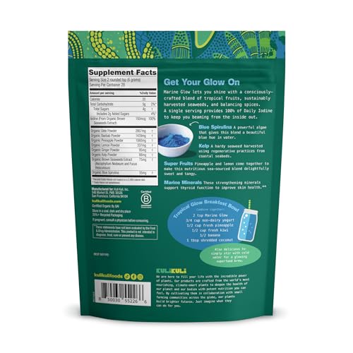 Close-up of blue spirulina powder swirling in container