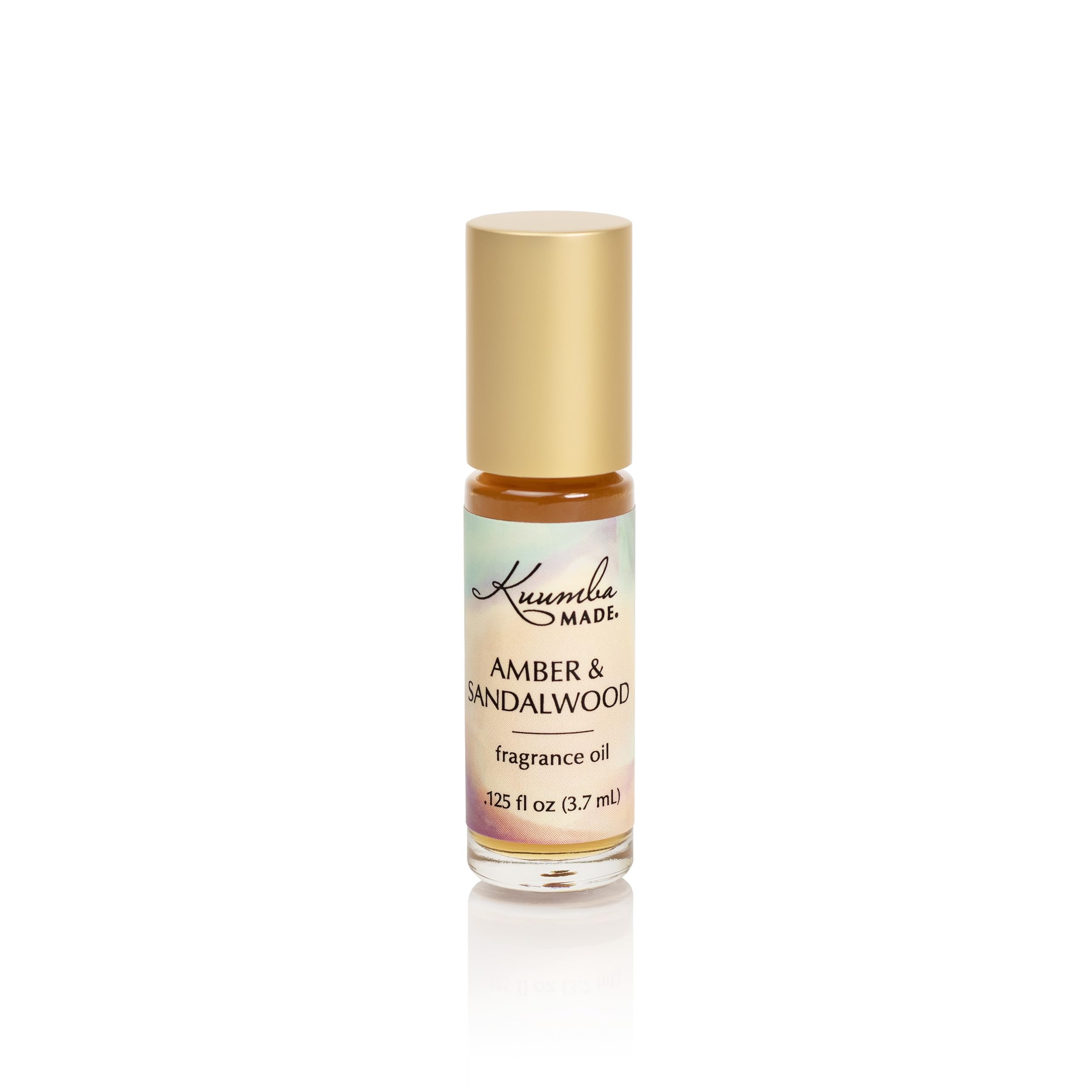 Kuumba Made Amber and Sandalwood roll-on bottle for on-the-go, long-lasting fragrance.