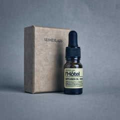 Ultrasonic diffuser in use with l'Hotel Diffuser Oil