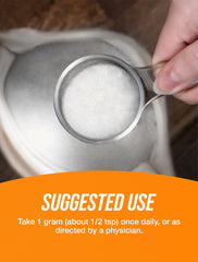 L-Methionine powder being added to a beverage