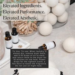 Wool dryer balls with oil droplets for scenting laundry