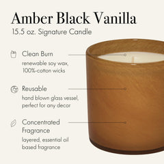 Close-up of Amber Black Vanilla wax in a reusable hand-blown glass vessel