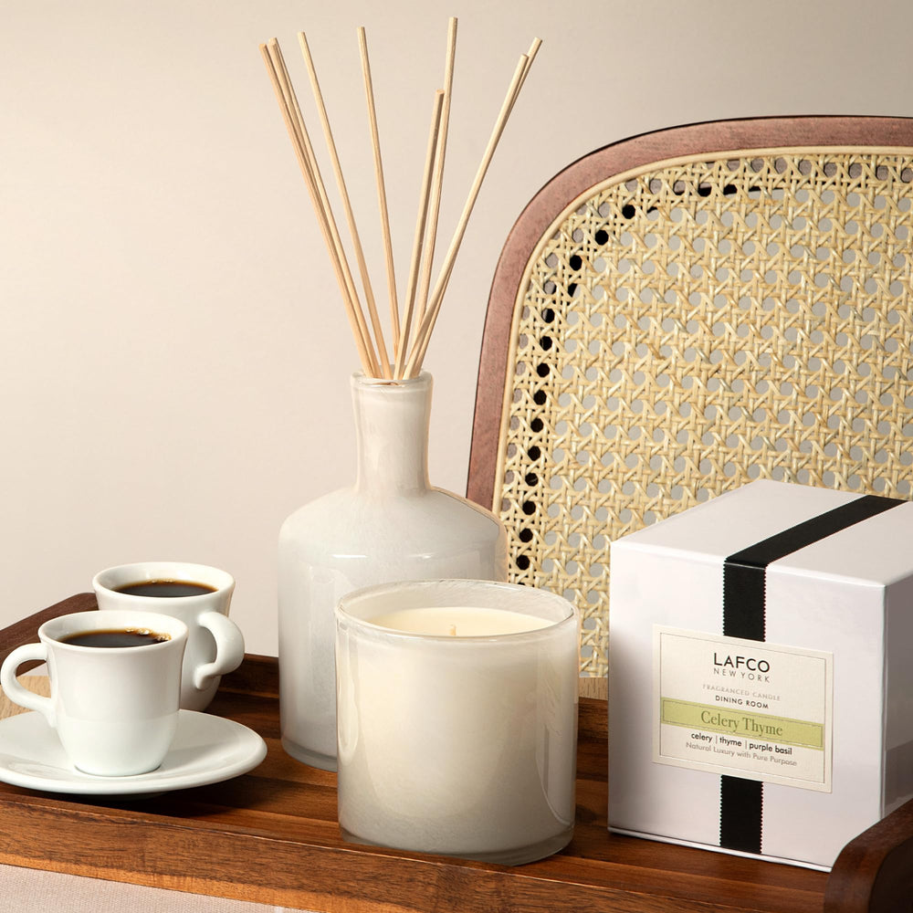 15.5 oz Celery Thyme candle with modern home decor setting