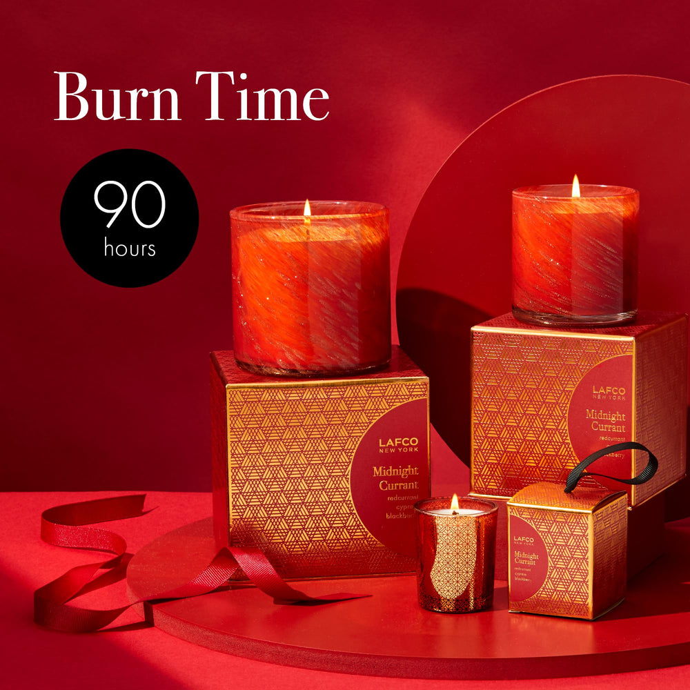 Candle lit with a slow, clean burn using renewable soy wax (Midnight Currant)