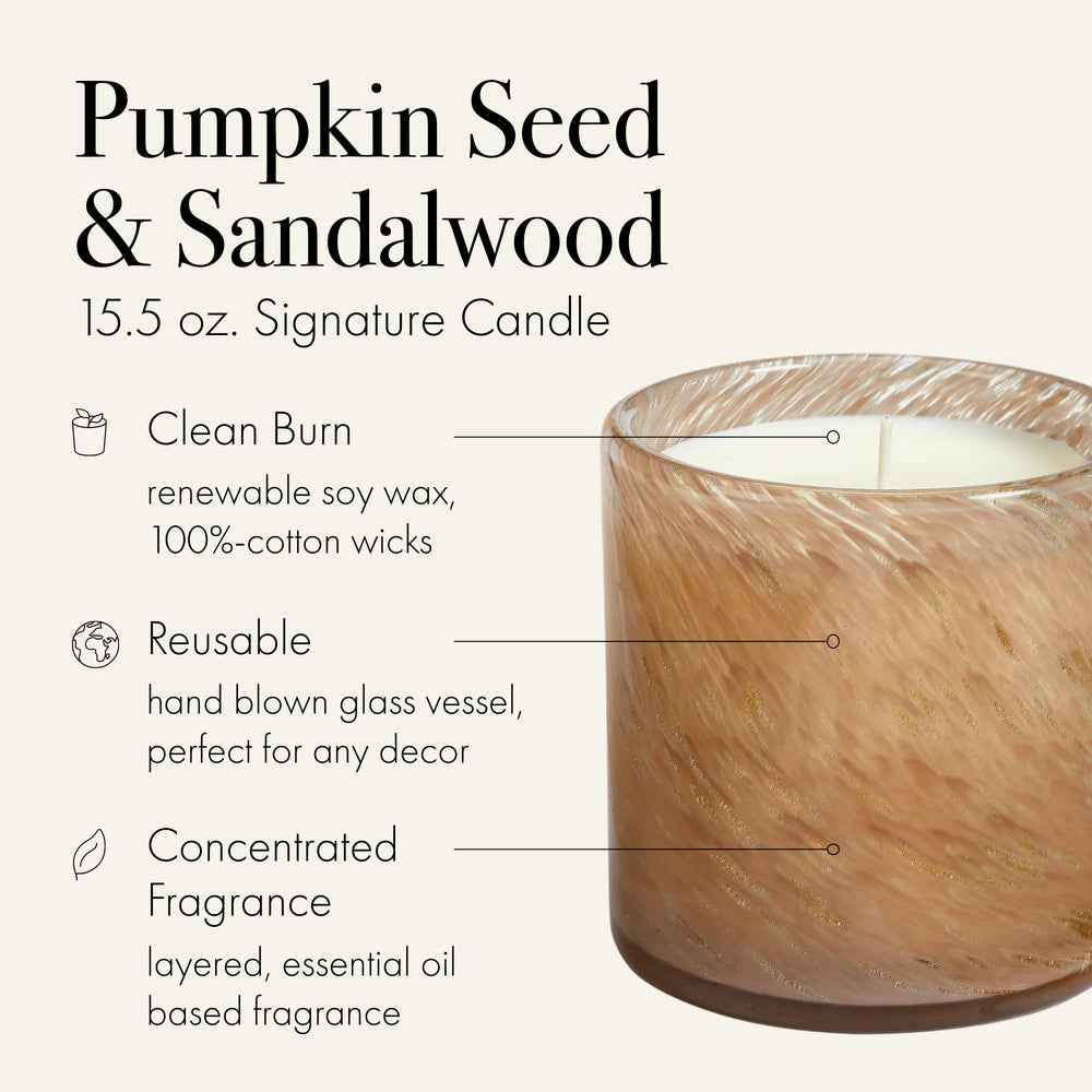Close-up of Pumpkin Seed & Sandalwood candle label showing 15.5 oz