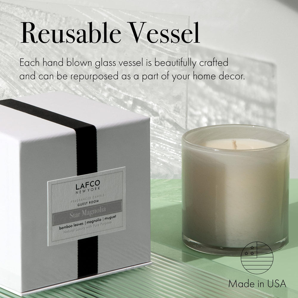 Star Magnolia candle in burn state showing wax and aroma