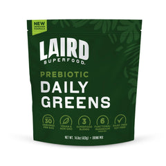 Front view of Laird Prebiotic Daily Greens powder bottle