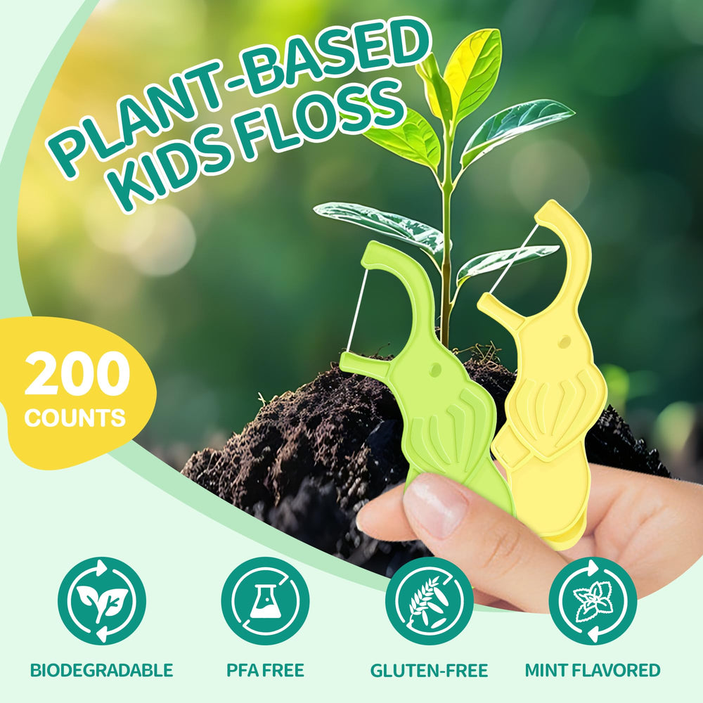 Close-up of elephant-shaped floss picks with mint flavor