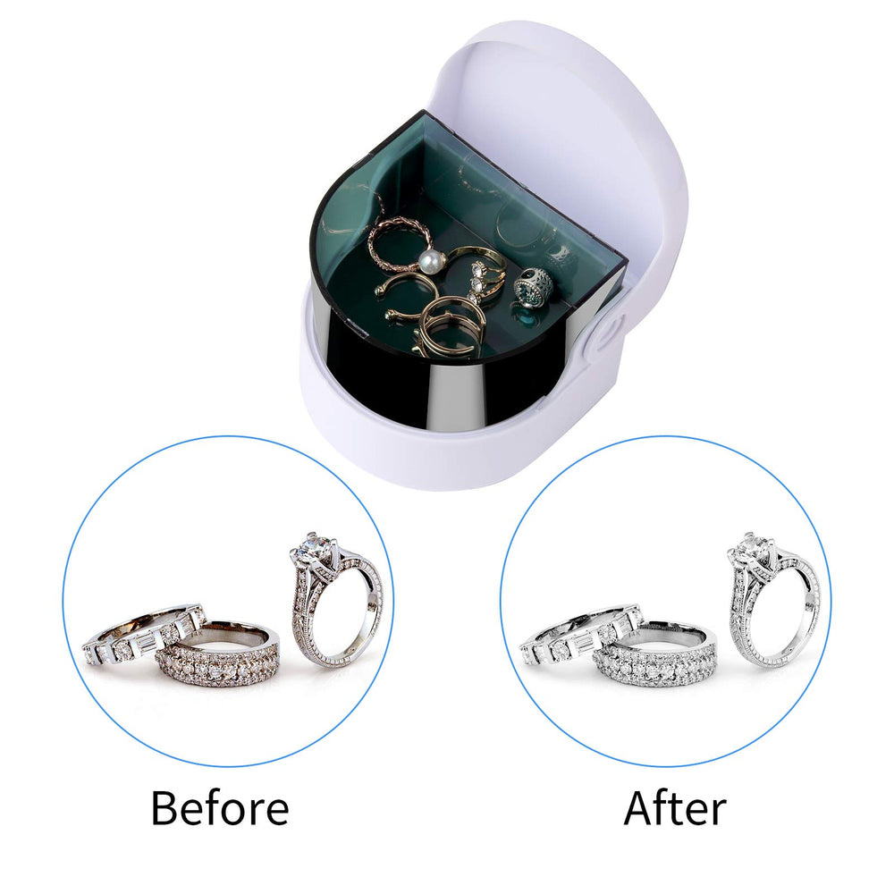 Jewelry pieces being cleaned in solution