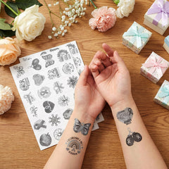 Landhoow gray ribbon tattoos for face, arms, and hands in campaigns