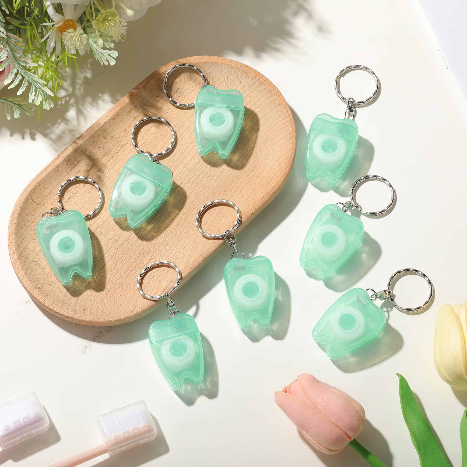 Bulk packaging visual for Landical dental floss keychain