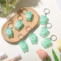 Bulk packaging visual for Landical dental floss keychain