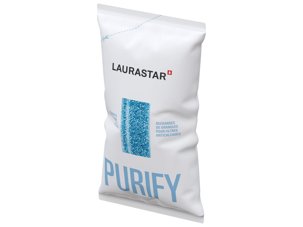 Laurastar ironing system with anti-scale granules in use
