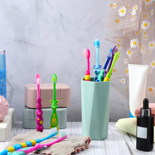 Colorful Lauwell toddler toothbrushes with animal patterns and protective covers