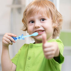 Brightly colored Lauwell toddler toothbrushes in animal shapes