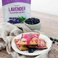 Pouring dried lavender into tea or infusion