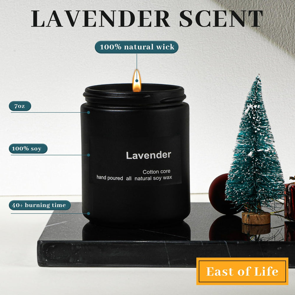 Lavender scented candle in exquisite frosted glass cup for relaxing mood.