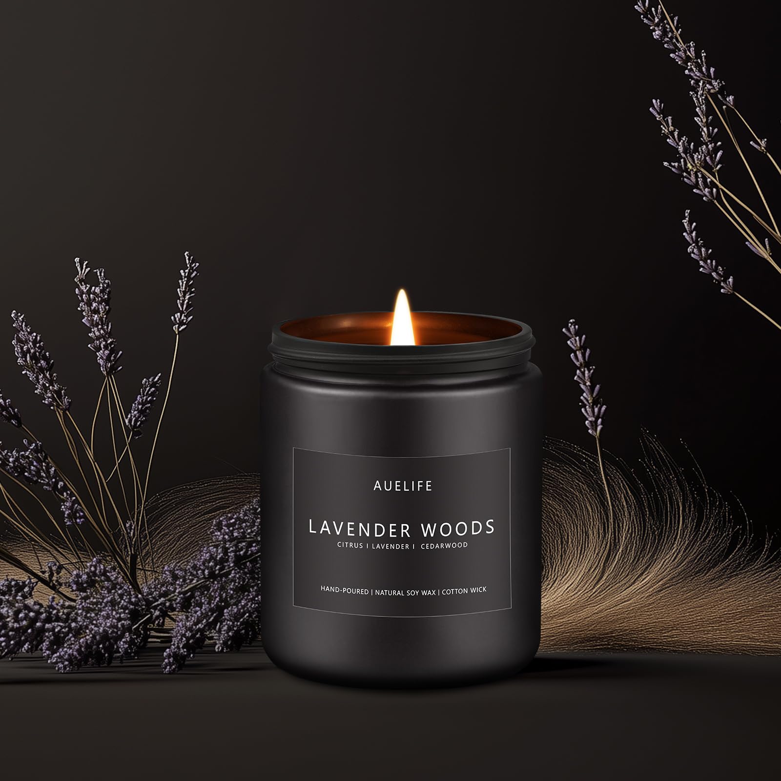 Masculine home decor with a lavender & wood scented candle in a black jar