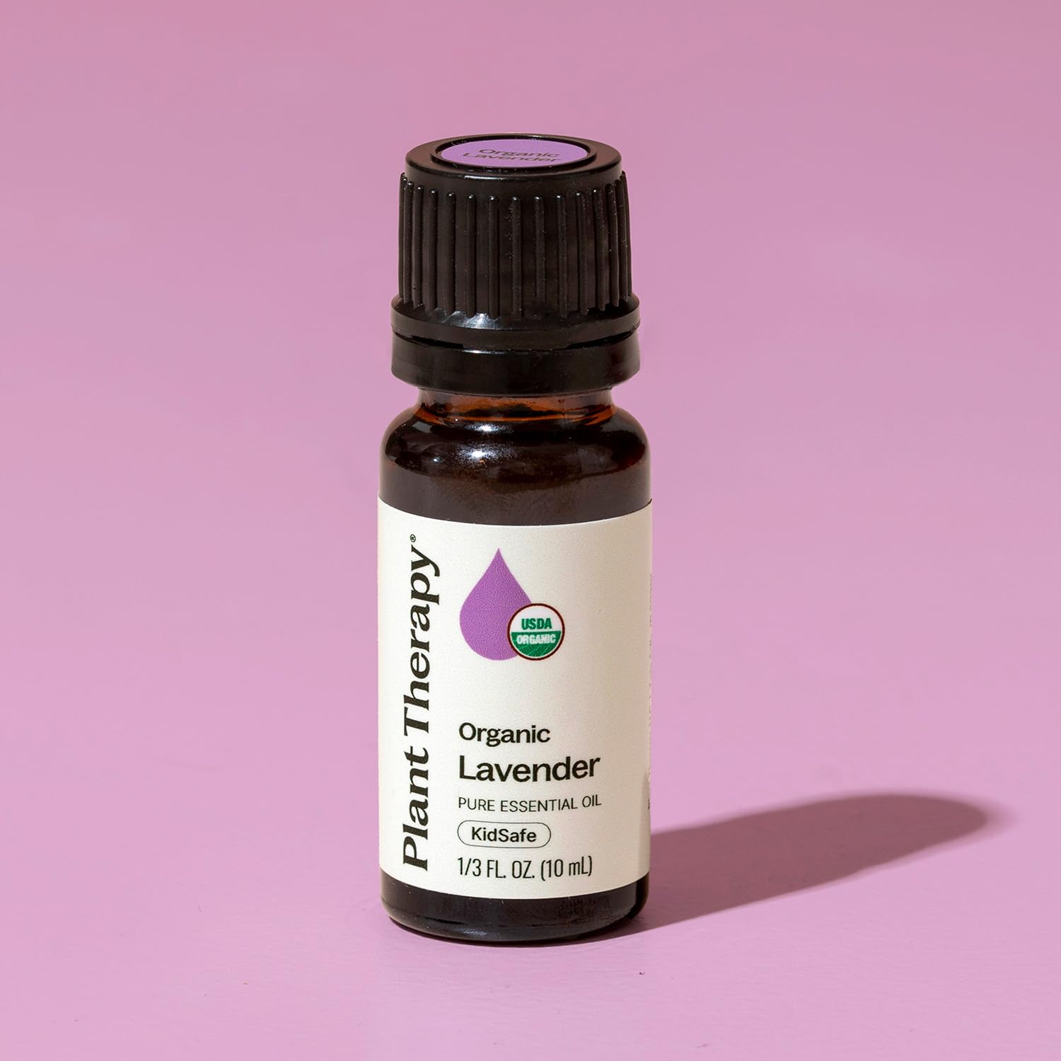 GC-MS report next to Organic Lavender Essential Oil bottle