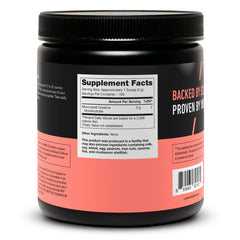 Prepared creatine drink in a glass showing mixability with water.
