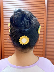 Lemeilleur tiny clips alternative for safe, soft-touch styling on children.