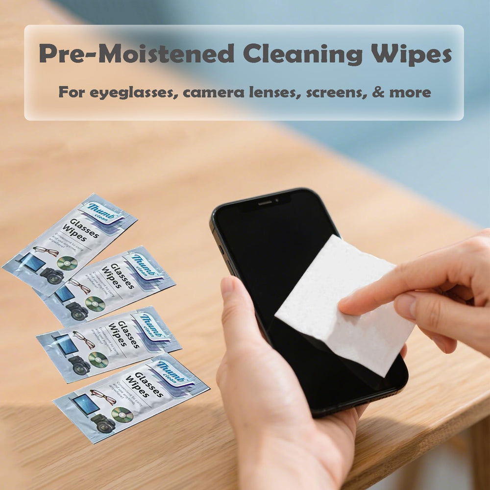 Eyeglasses being cleaned with lens wipes